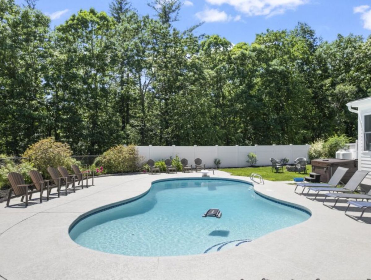Gunite pool with new plaster, tile and large expanded patio installed in 2026