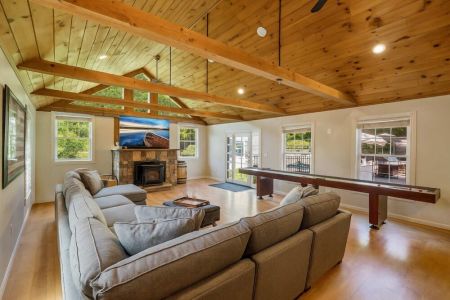 Great Room w/ 70 inch TV, and plenty of seating for the big game