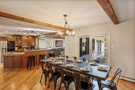 Kitchen table with seating for 10 and bar seating for another 6 (plus tons of outdoor seating)