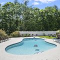 Gunite pool with new plaster, tile and large expanded patio installed in 2026