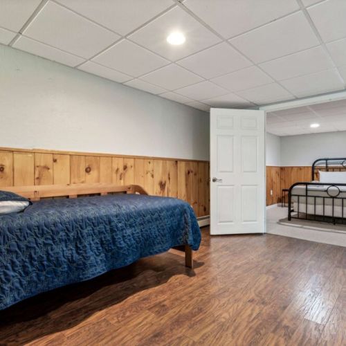 Queen bed Lower Level w/ Twin in Common Space