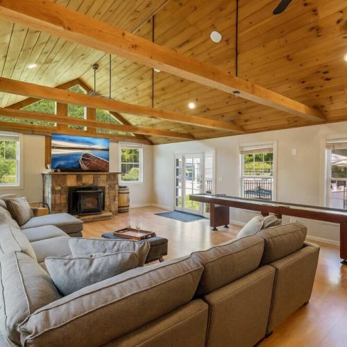 Great Room w/ 70 inch TV, and plenty of seating for the big game